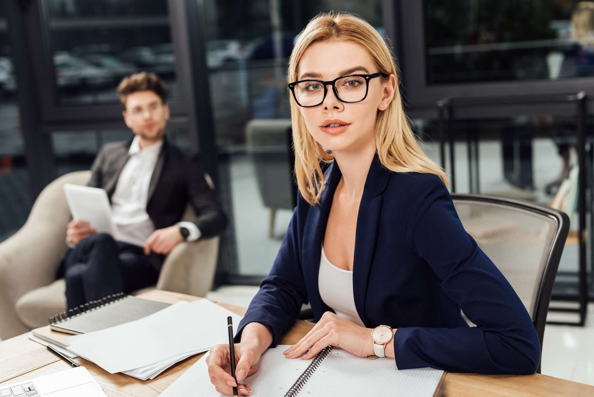 selective-focus-of-businessman-looking-at-businesswoman-in-eyeglasses-that-looking-at-camera-at.jpg selective-focus-of-businessman-looking-at-businesswoman-in-eyeglasses-that-looking-at-camera-at.jpg